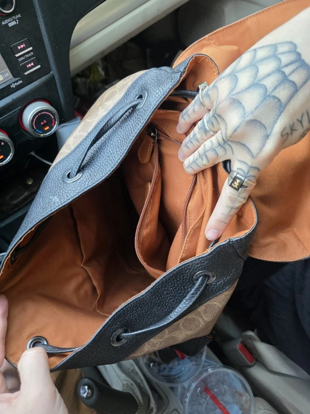 Coach backpack signature